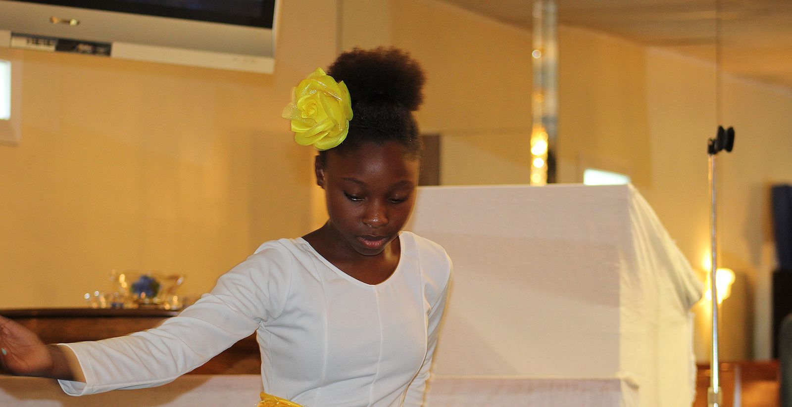 A young dancer ministering during a service